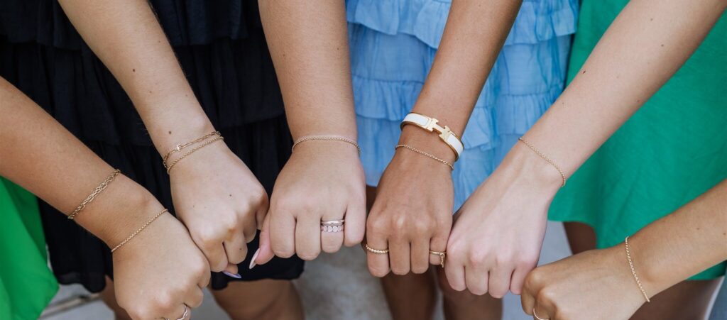 Group of girls getting permanent jewelry
